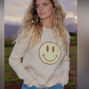 Smiley Face Distressed Hem Sweater